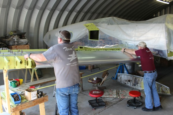 XP-82 Twin Mustang Restoration - February 2014 Update 12 Paul and Randall test fitting the leading edge skin on the right-hand outer wing panel. (photo via Tom Reilly)