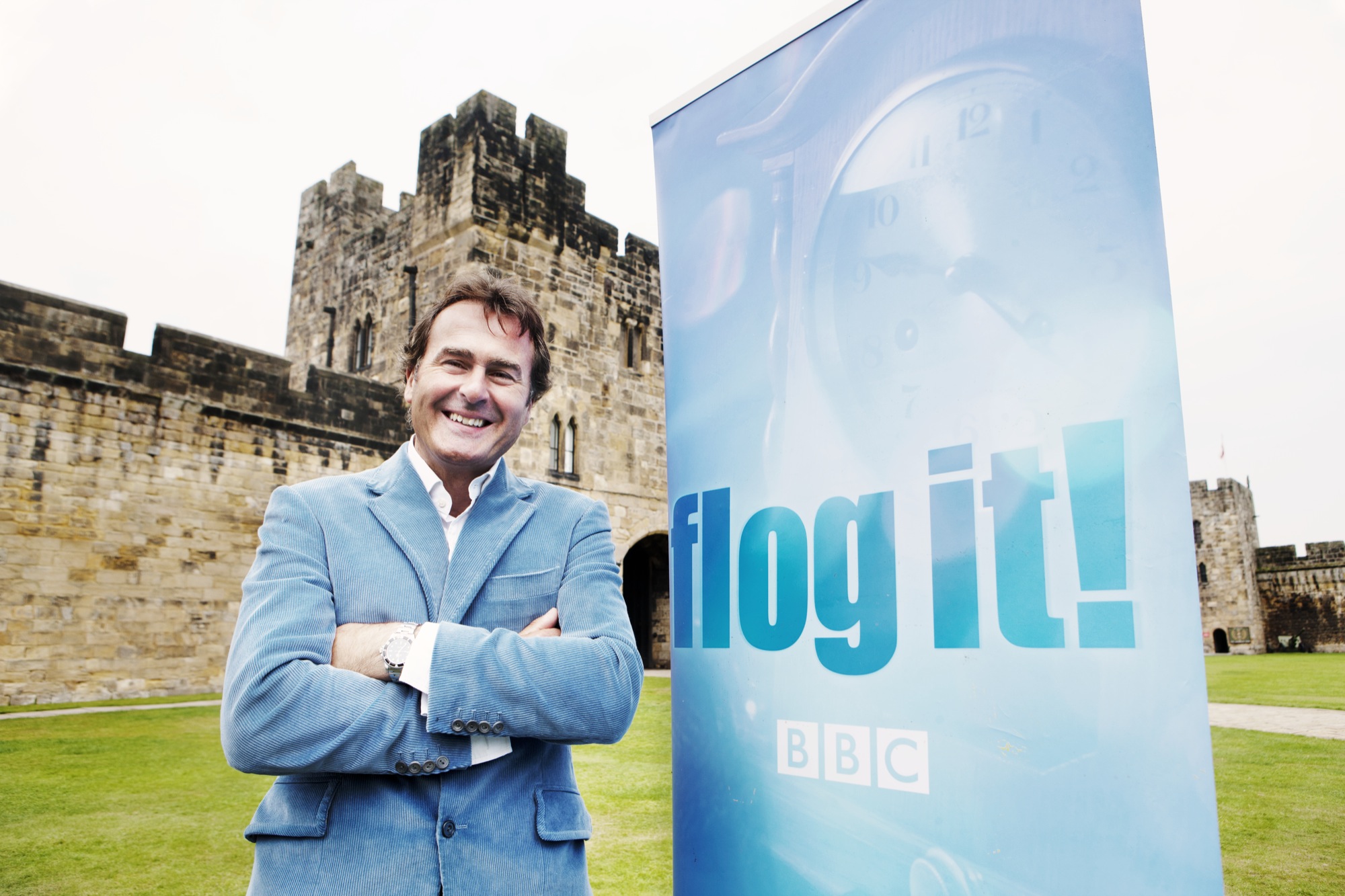 BBC Antiques Series 'Flog It' Goes To RAF Museum London 11 Flog It! 2011 - Paul Martin with logo banner