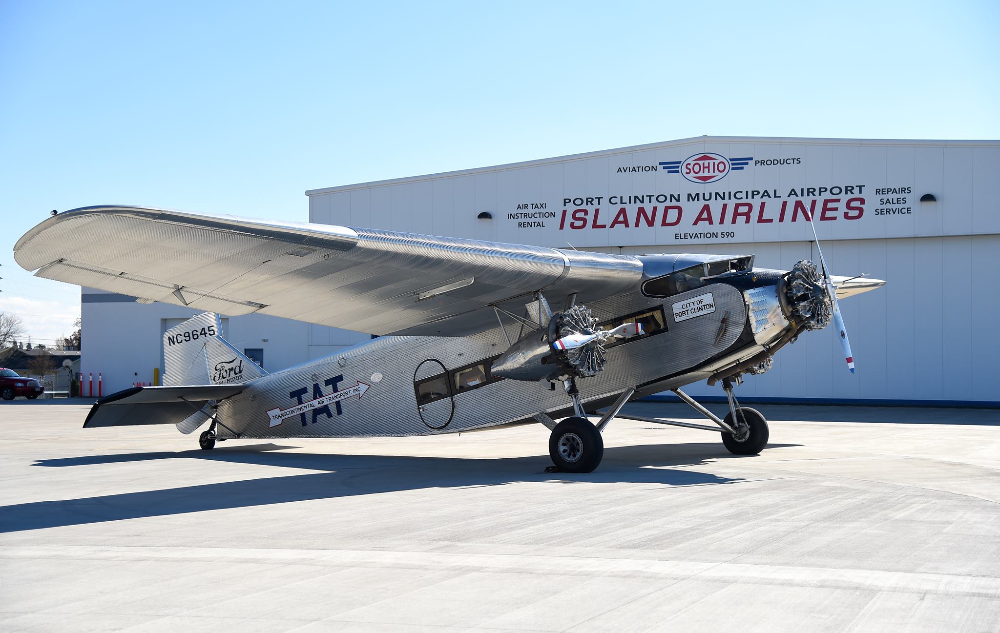 Step Back in Time: Fly the Legendary 1928 Ford Tri-Motor at the Air Zoo 11 Ford 5 AT B NC9645 City of Wichita City of Port Clinton in front of Liberty Aviation Museum s hangar Liberty Aviation Museum