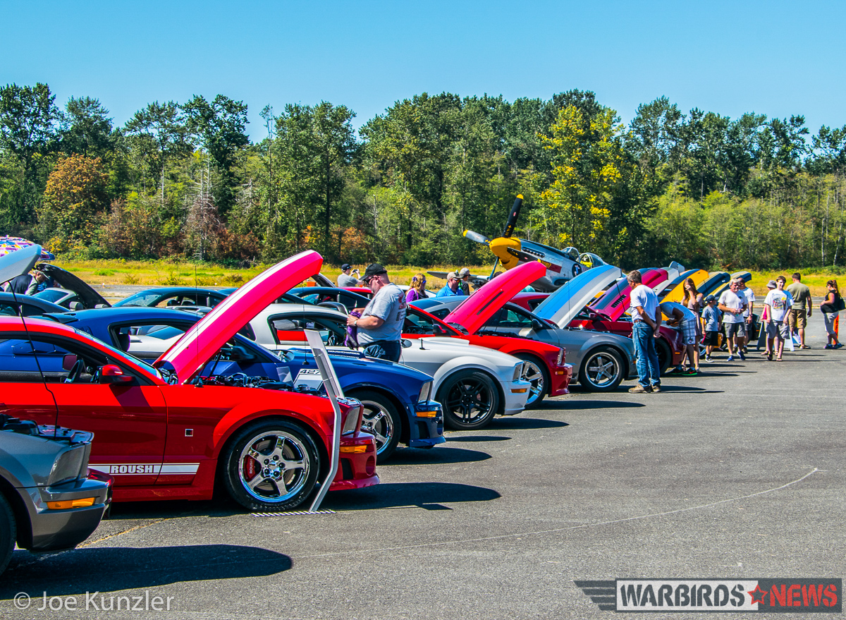 Props & Ponies at the Heritage Flight Museum - Air Show Report 23 Just some of the fifty or so Ford Mustangs on display at Props & Ponies. (photo by Joe Kunzler)