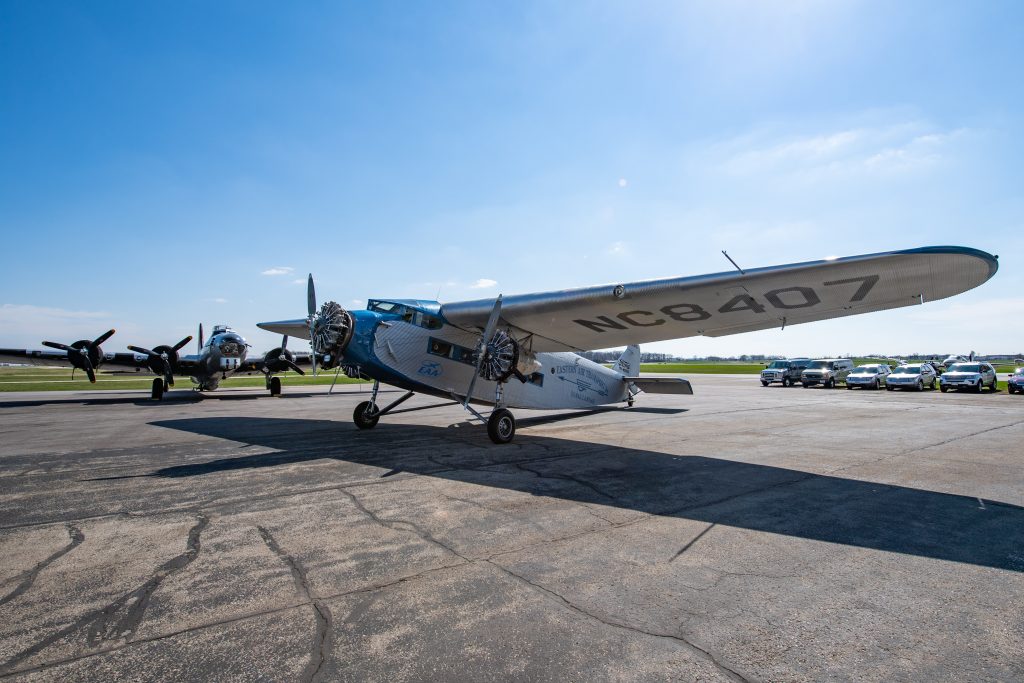 EAA Ford Tri-Motor Tour Brings Vintage Flight Experiences to Cities Across the U.S. in 2025 14 Ford Tri Motor and B 17 at Weeks Hangar by Connor Madison
