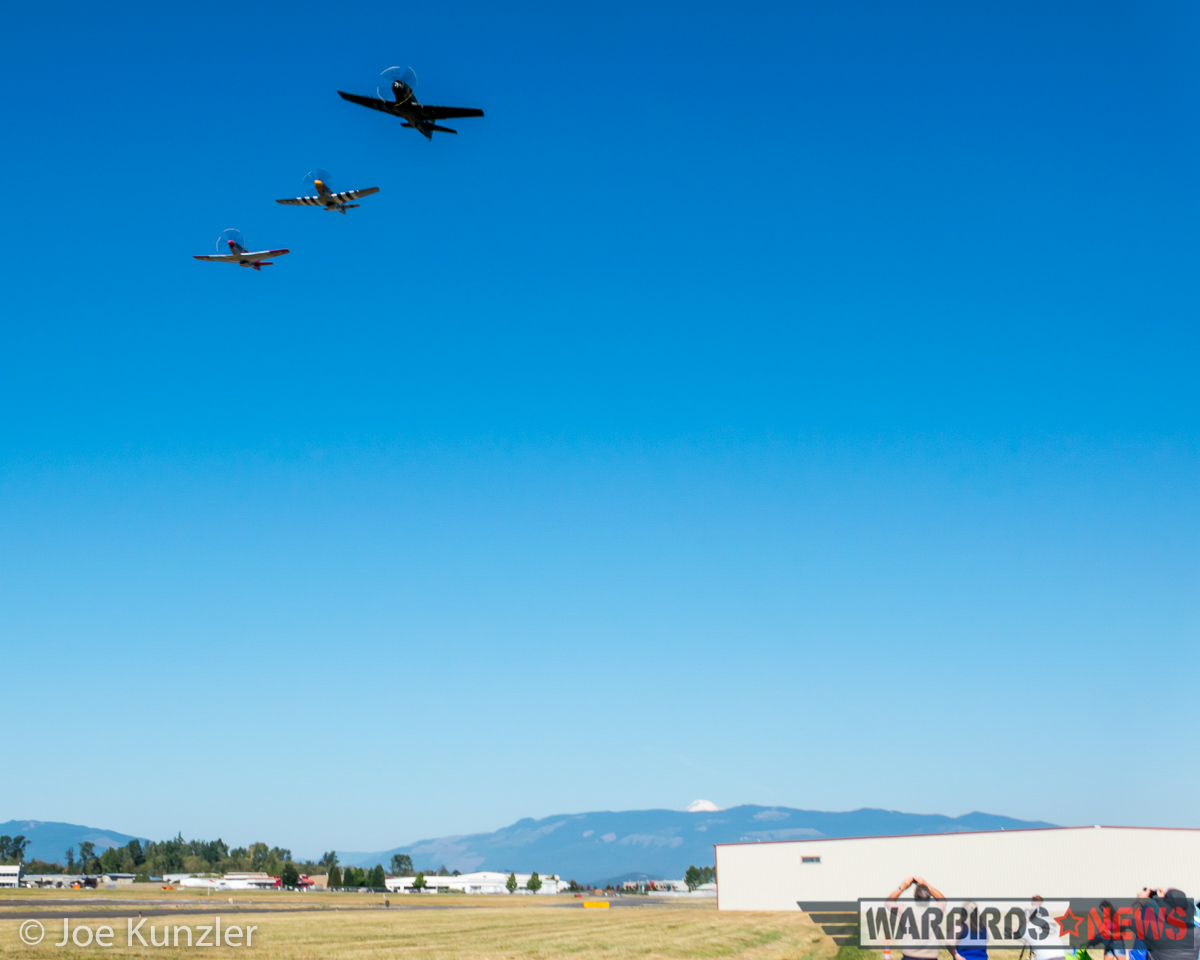 Props & Ponies at the Heritage Flight Museum - Air Show Report 41 The formation break up begins, with the Skyraider pealing off before landing. (photo by Joe Kunzler)