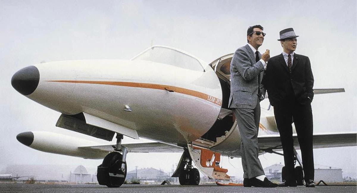 Elvis and the Learjet 10 Frank Sinatra and Dean Martin in front of the Learjet