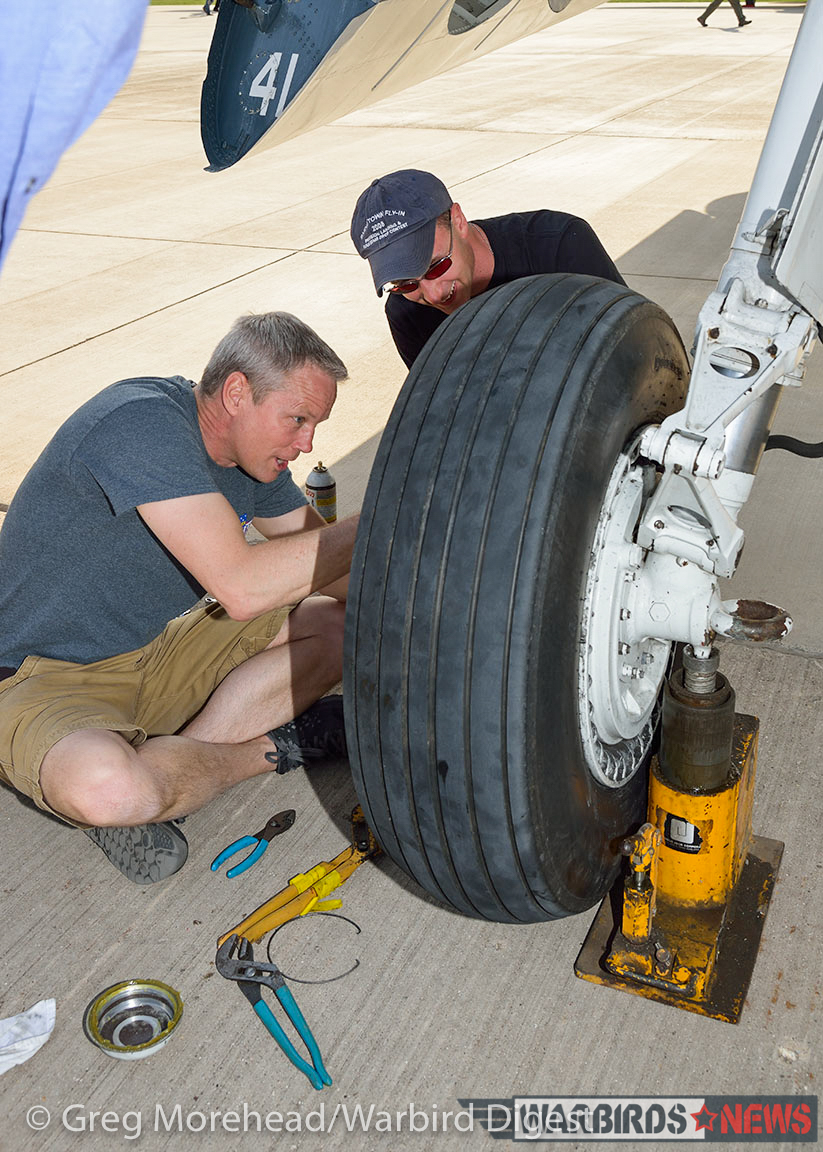TBM Gathering - 90 Tons of Turkeys Invade Illinois 15 Working on the undercarriage. The scale of the tire to the man gives some idea of how massive the TBM is! (photo by Greg Morehead, courtesy of Warbird Digest magazine)