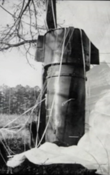 Broken Arrow 11 Close up of one of two Mk.39 thermonuclear bombs rests in a field in Faro, NC after falling from a disintegrating B-52 bomber. (image via Wikipedia)