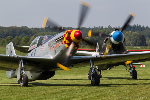 Air Show Report: Germany's Hahnweide Oldtimer Air Show 2013 14 P-51 Mustang and P-40 Warhawk made the trip from France to attend. (Image Credit: Andreas Zeitler)
