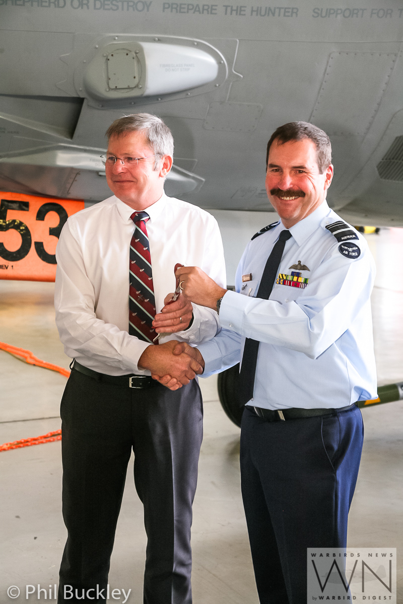 Former RAAF Lockheed Orion Officially Handed Over to HARS 17 Handing over the "keys" to the Orion. (photo by Phil Buckley)