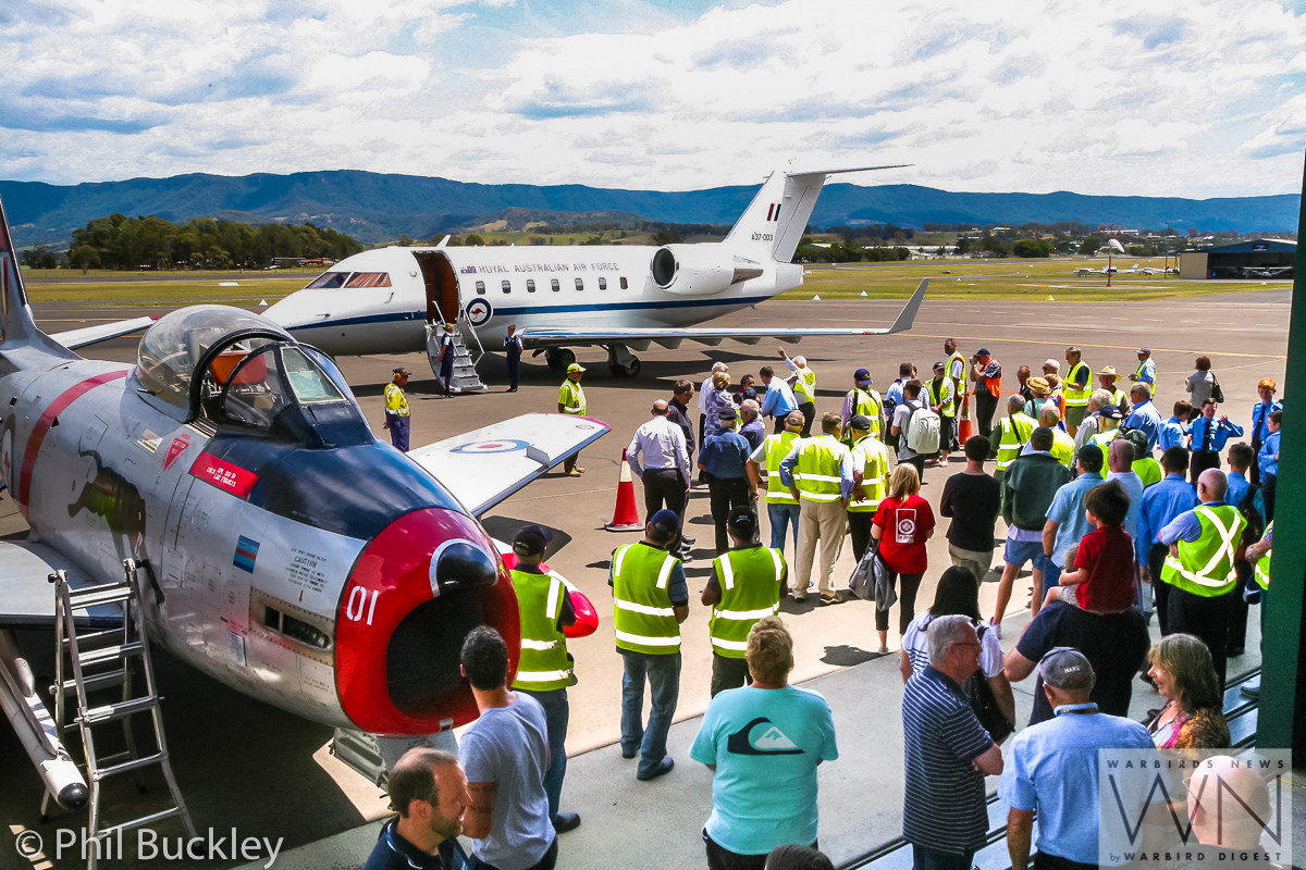Former RAAF Lockheed Orion Officially Handed Over to HARS 34 Chief of Air Force Davies saying goodbye to local officials before boarding his jet. The HARS Sabre is on display to the left of the image. (photo by Phil Buckley)