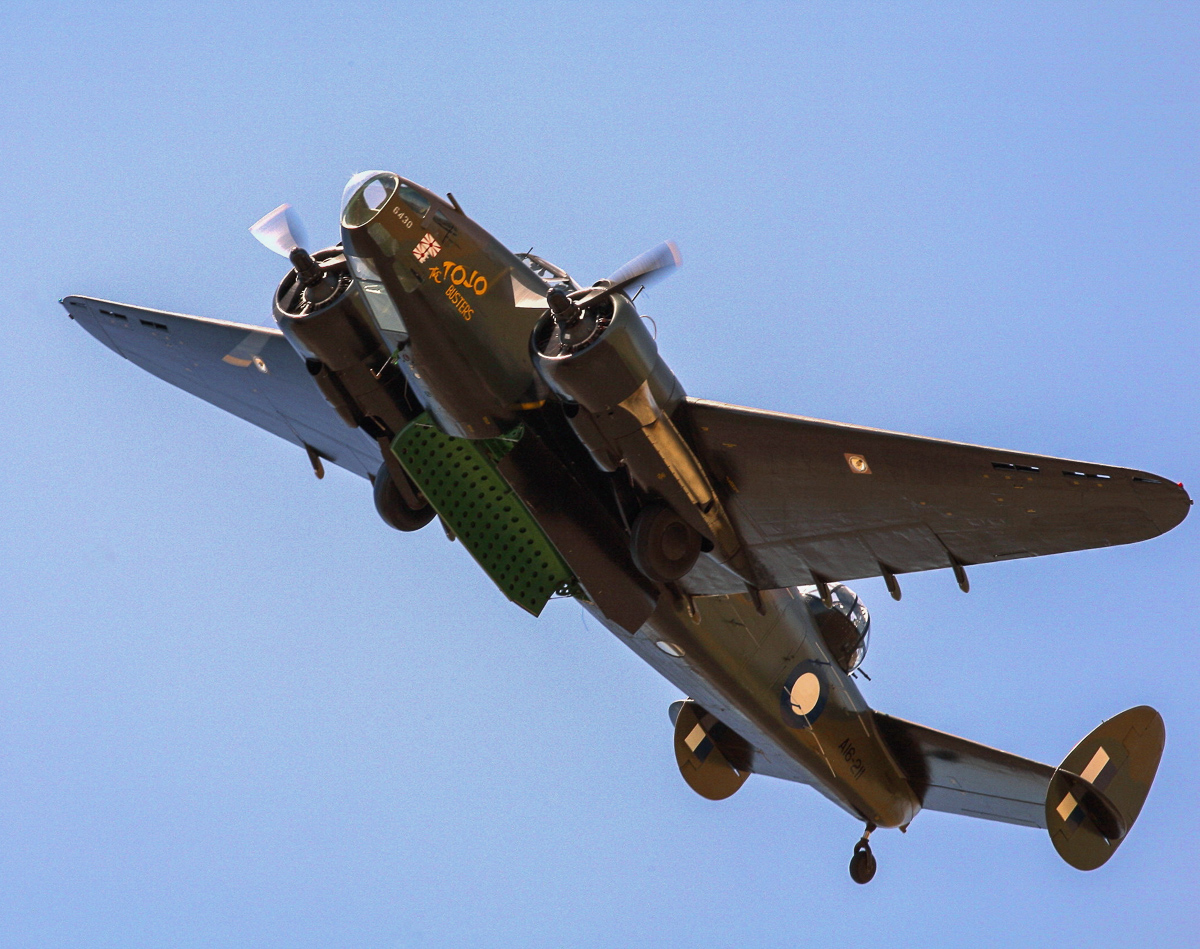 2015 Temora Aviation Museum - Warbirds Downunder Air Show Report 23 A great shot of the Lockheed Hudson strutting its stuff with bomb bay doors open. (photo by Phil Buckley)