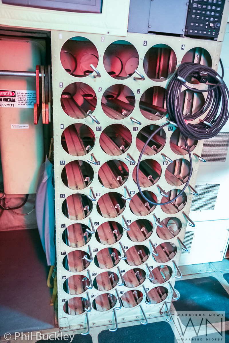 Former RAAF Lockheed Orion Officially Handed Over to HARS 28 The sonoboy storage rack inside the Orion's fuselage. (photo by Phil Buckley)