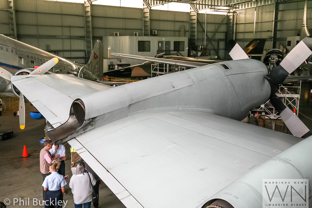Former RAAF Lockheed Orion Officially Handed Over to HARS 27 A view over the Orion's wing inside the HARS hangar. Also visible are the museum's DC-3, F-111C and C-54 . (photo by Phil Buckley)