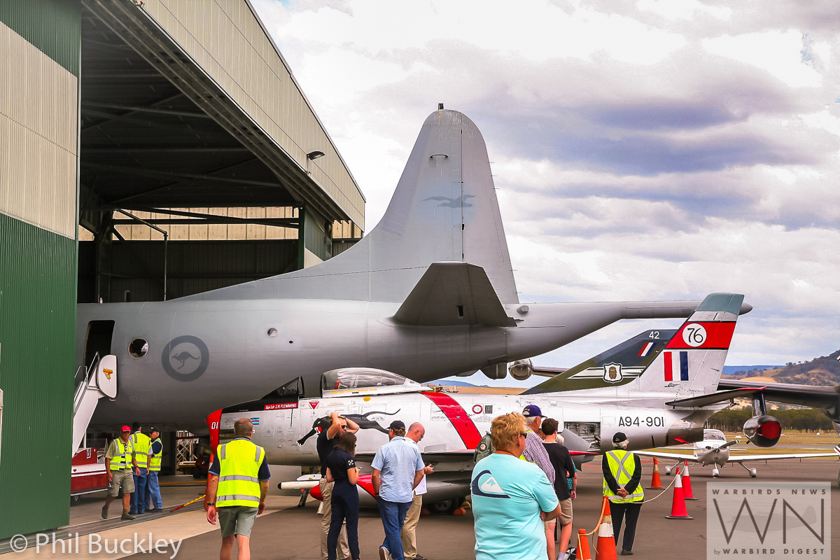 Former RAAF Lockheed Orion Officially Handed Over to HARS 30 HARS Orion partially inside the hangar, parked beside their Sabre A94-901 and Mirage IIIO A3-42. (photo by Phil Buckley)