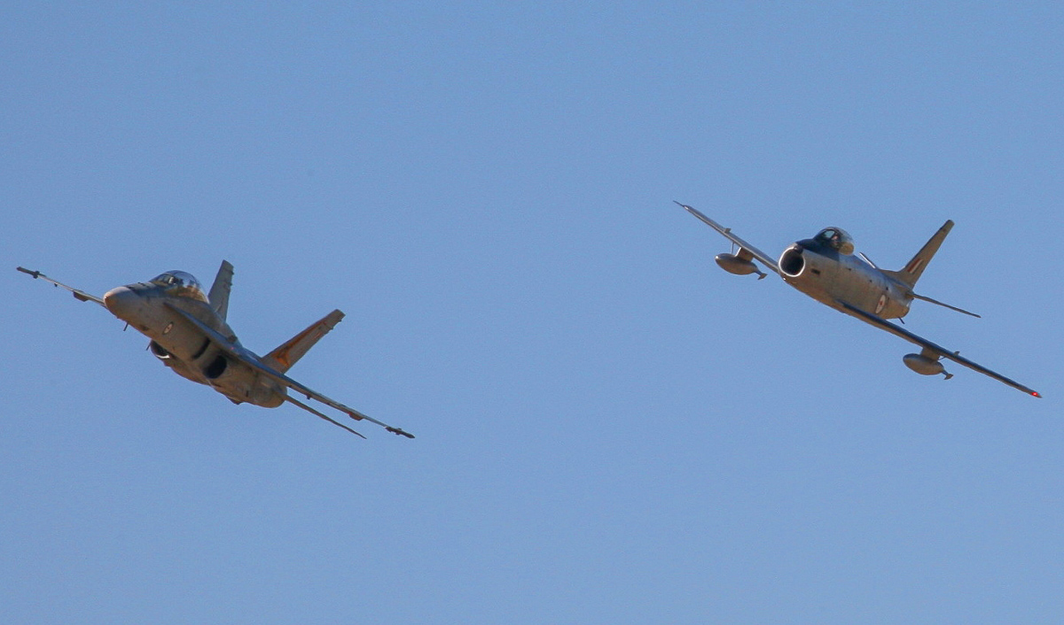 2015 Temora Aviation Museum - Warbirds Downunder Air Show Report 26 The 'Avon Sabre' in formation with a current-duty RAAF F/A-18B Hornet. (photo by Phil Buckley)