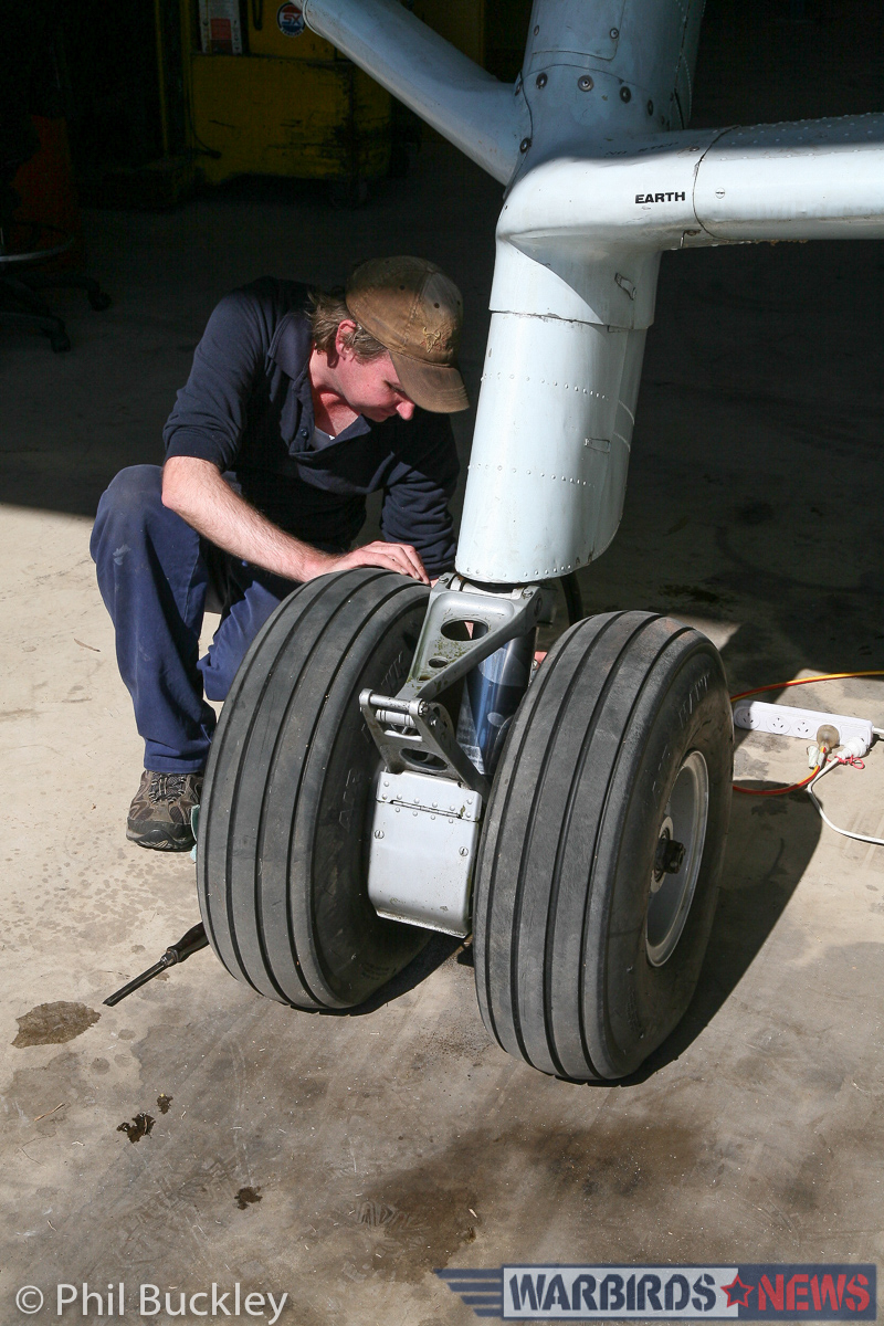 Twin Pioneer Restoration Update from Downunder 17 Mark Booth checking the brake lines during the bleed process. (photo by Phil Buckley)
