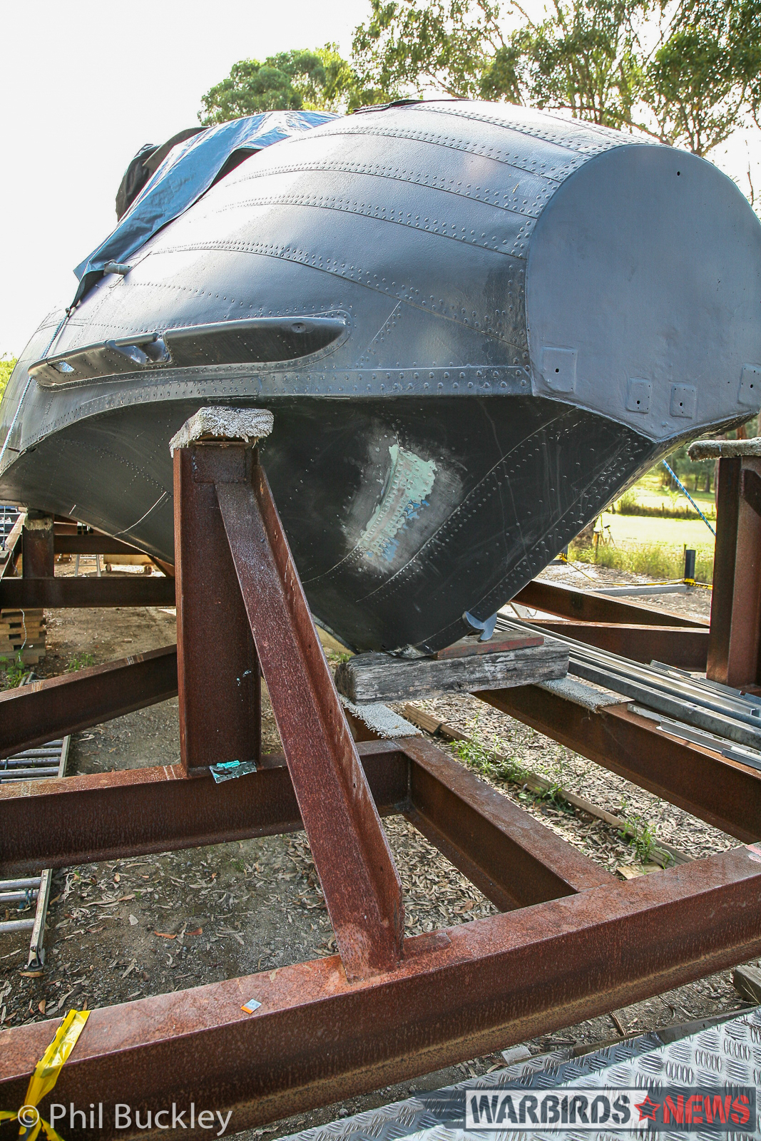 Downunder PBY - Restoration Report from Rathmines, Australia 13 Modifying the steel frame around the fuselage. (photo by Phil Buckley)