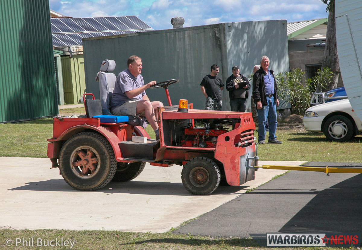 Twin Pin Revival - A Classic Warbird Transport Comes Back to Life Down Under 15 Towing the Twin Pin from her hangar. (photo by Phil Buckley)