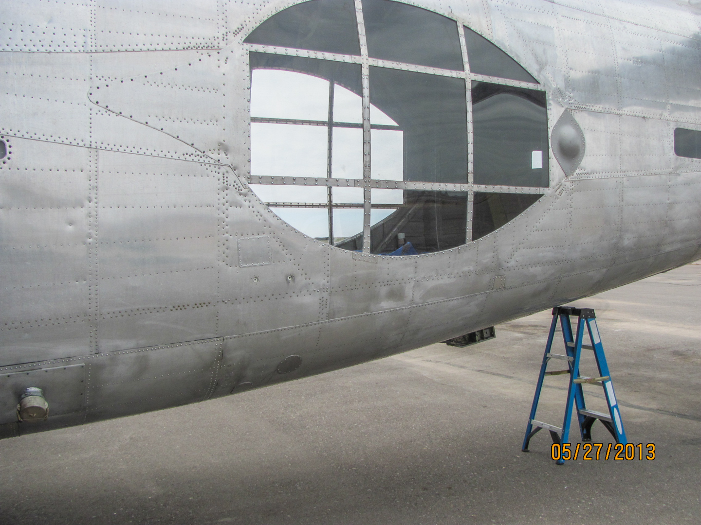 Privateer Airborne 24 The previously faired over waist windows have been opened up and sheeted in Plexiglas as installed in the Coast Guard variant. The Navy versions had a massive gun turrets mounted at these stations. (GossHawk Unlimited photo)