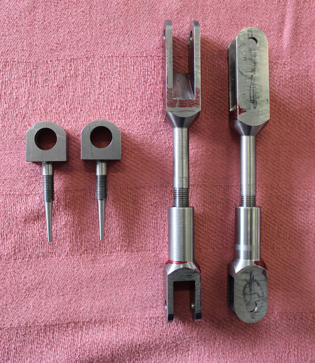 XP-82 Twin Mustang - September, 2014 Restoration Update 26 Outboard aileron hinge bearing mounts (left) and outboard flap push rods (right). (photo via Tom Reilly)