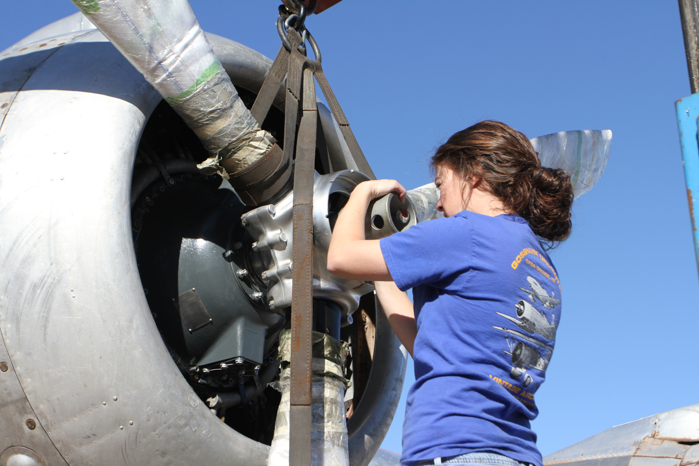 Privateer Airborne 11 Lindsey Goss working on the #4 prop after a dynamic balance test uncovered an issue. (GossHawk Unlimited photo)