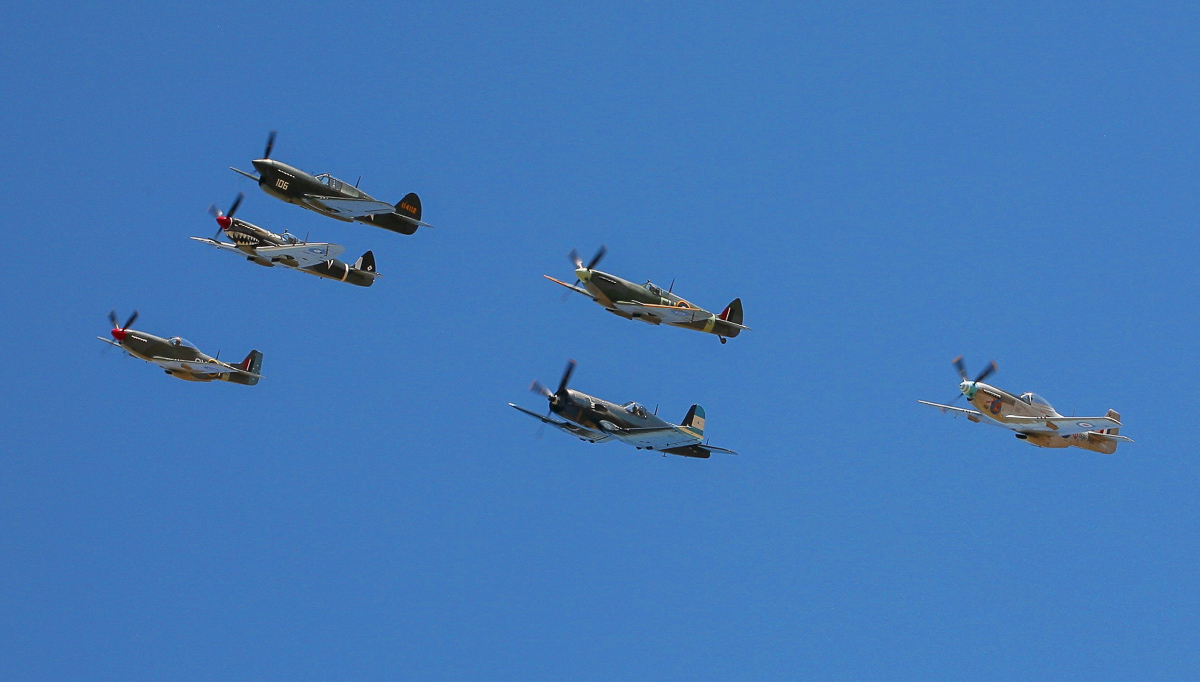 2015 Temora Aviation Museum - Warbirds Downunder Air Show Report 15 A gaggle of WWII-era fighters in formation was a highlight of Warbirds Downunder. (photo by Phil Buckley)
