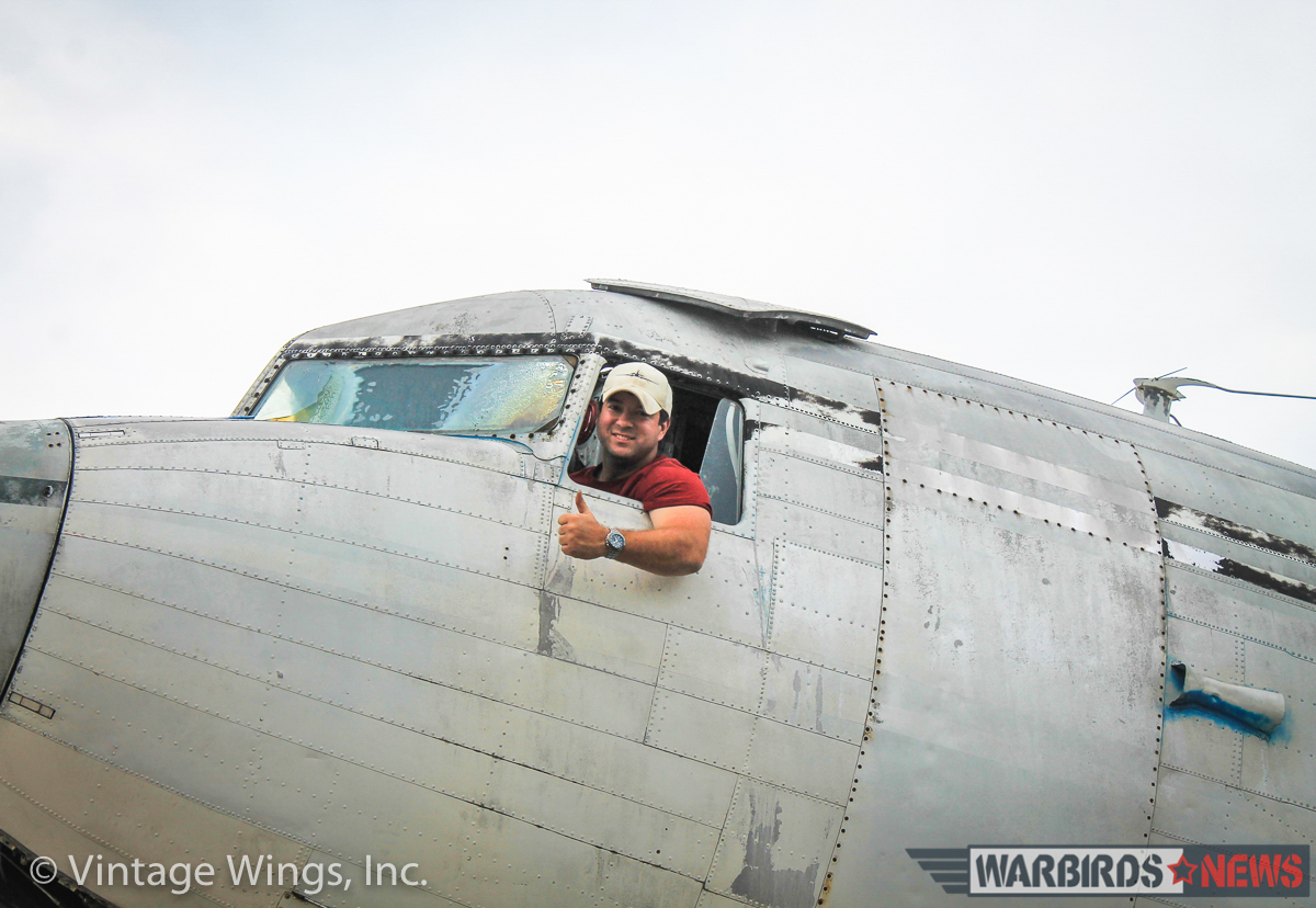 'Beach City Baby' - A C-53 Skytrooper Will Rise Again 11 Jason Capra sitting in the cockpit of Beach City Baby. (photo via Vintage Wings, Inc.)