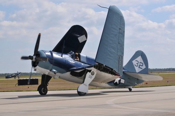 Airshow Report: Wings Over Houston 2013 11 The unmistakeable, massive Helldiver folding its wings after the performance. (Image credit Luigino Caliaro)