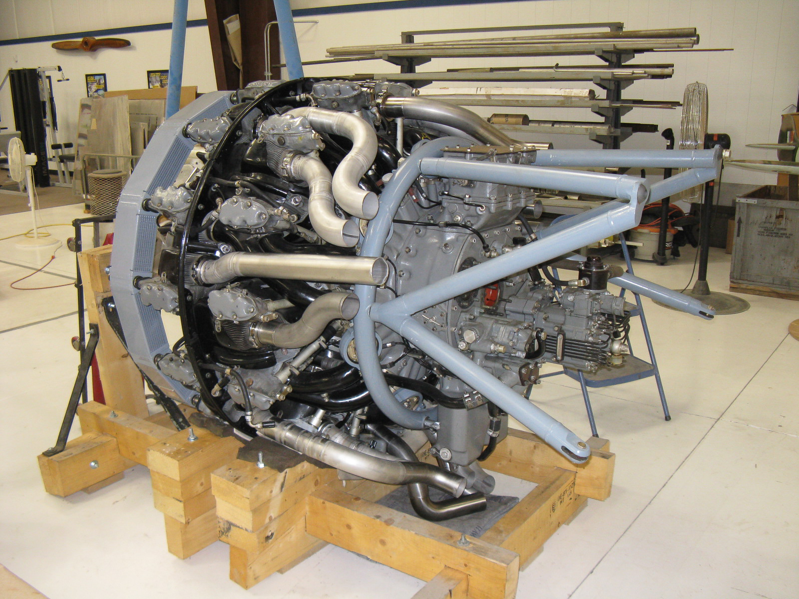 FW-190 First Flight At GossHawk Unlimited!!! 51 Installing the mount and exhaust on the ASh-82 engine. (photo via GossHawk Unlimited)