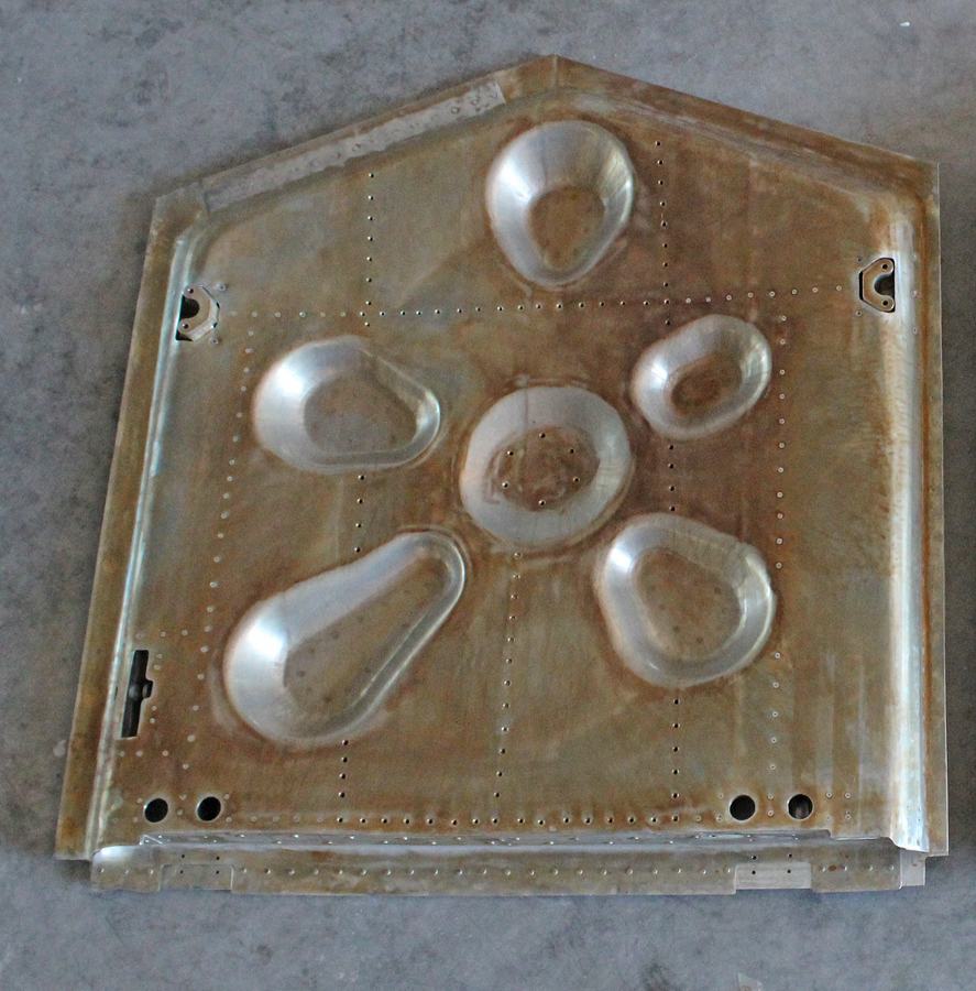 XP-82 Twin Mustang - October, 2017 - Restoration Update 19 The main gear doors and interior skins went through an alodine dip (note the yellowish hue) prior to primer-painting. (photo via Tom Reilly)