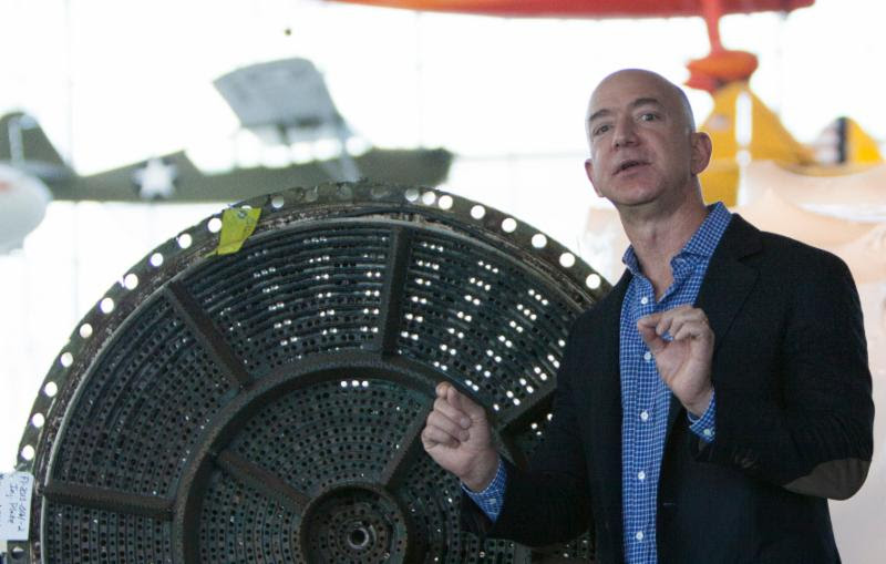 Book Talk at the Museum of Flight in Seattle Explores Rivalries in the New Space Race 11 Jeff Bezos with part of the Apollo 12 F 1 engine
