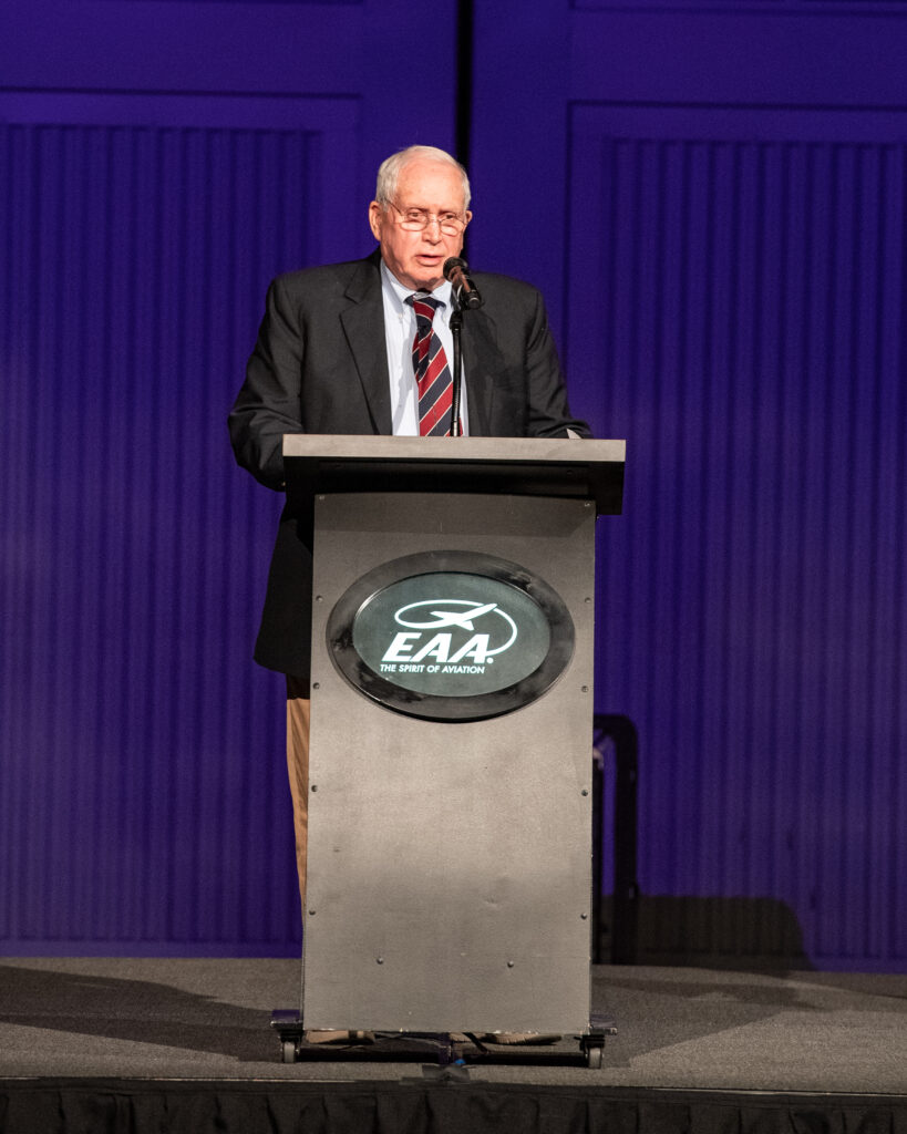 Chuck Greenhill and John Parish Sr. Inducted in The EAA Hall of Fame 10 John Parish Sr. at podium by Sam Sasin
