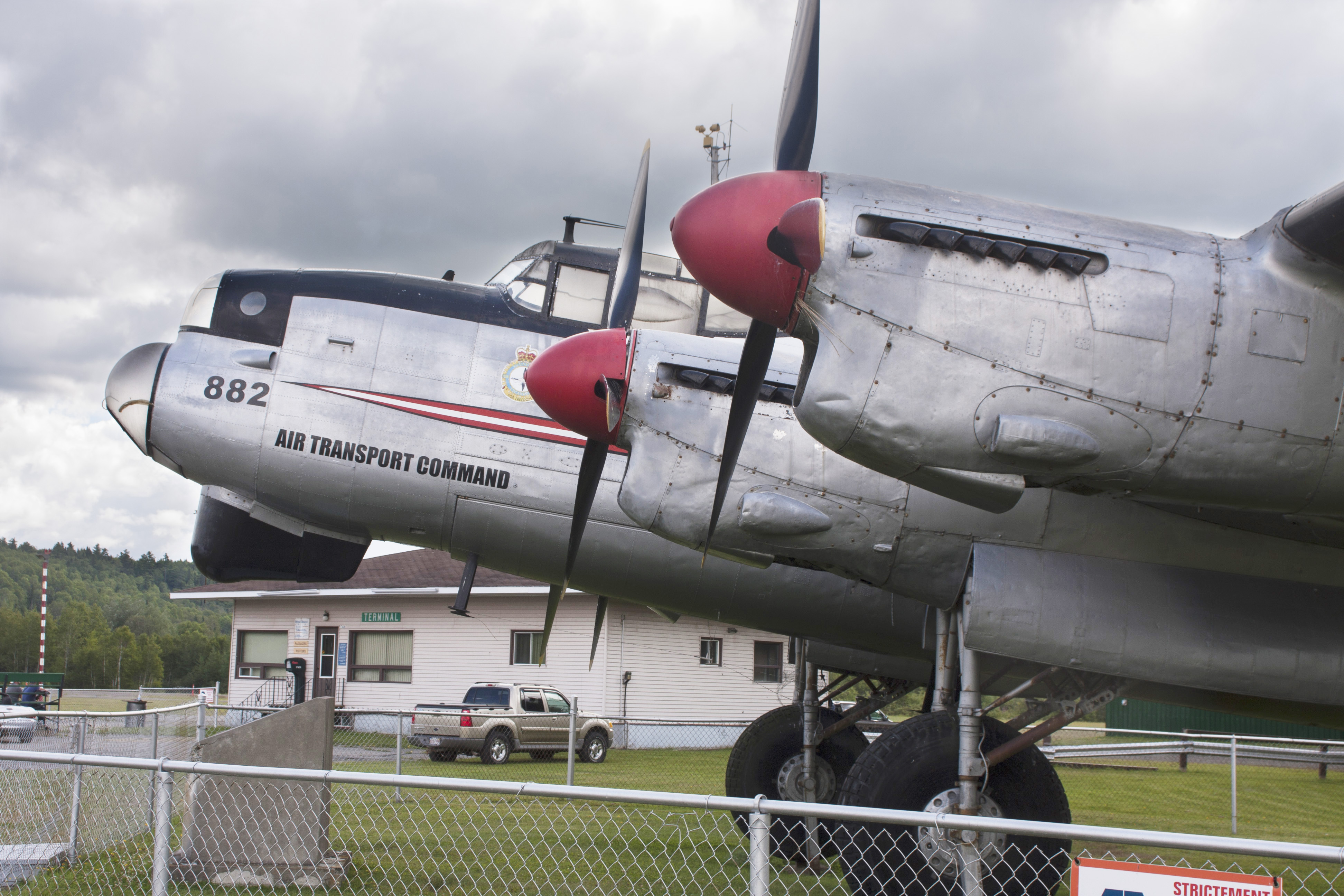 Avro Lancaster KB882; Coming in From the Cold? 11 The storm clouds gather over KB882 as the Edmundston City Council decides her fate. (photo via Benoit de Mulder)