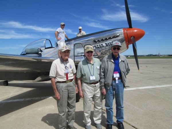 A Mustang Named "Pecos Bill" 11 "Pecos Bill" with three happy customers in Kansas: WWII veterans (l-r) Raymond Fary, Clifford Kantz and Lynus Ryan. (photo by Jen Charlton)