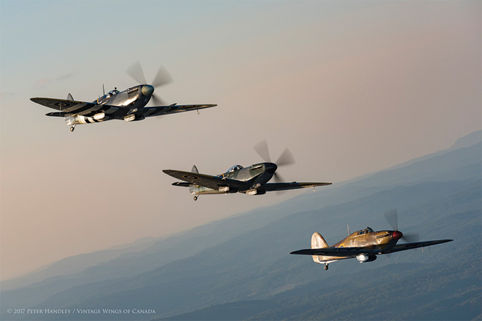 A sunset Mission to Honor the Canadians in The Battle of Britain 14 Kissmann drops below the formation, while Handley twists round in the Harvard's cockpit to look back. Photo: Peter Handley, Vintage Wings of Canada