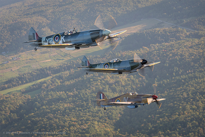 A sunset Mission to Honor the Canadians in The Battle of Britain 15 Long shadows over Outaouais farm land and woodlands gives a soft and hazy backdrop as the formation turns toward the sun once again. Photo: Peter Handley, Vintage Wings of Canada