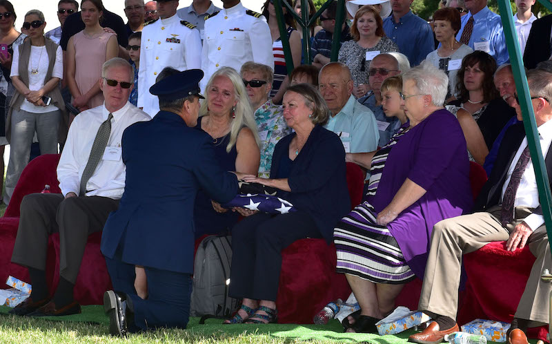 Air Force Salutes ‘Flying Tiger’ After 75 Year Journey Home 11 Lynn Evans, niece of John Dean Armstrong, a Flying Tiger, is presented a flag during Armstrong’s funeral, June 17, 2017, in Hutchinson, Kan