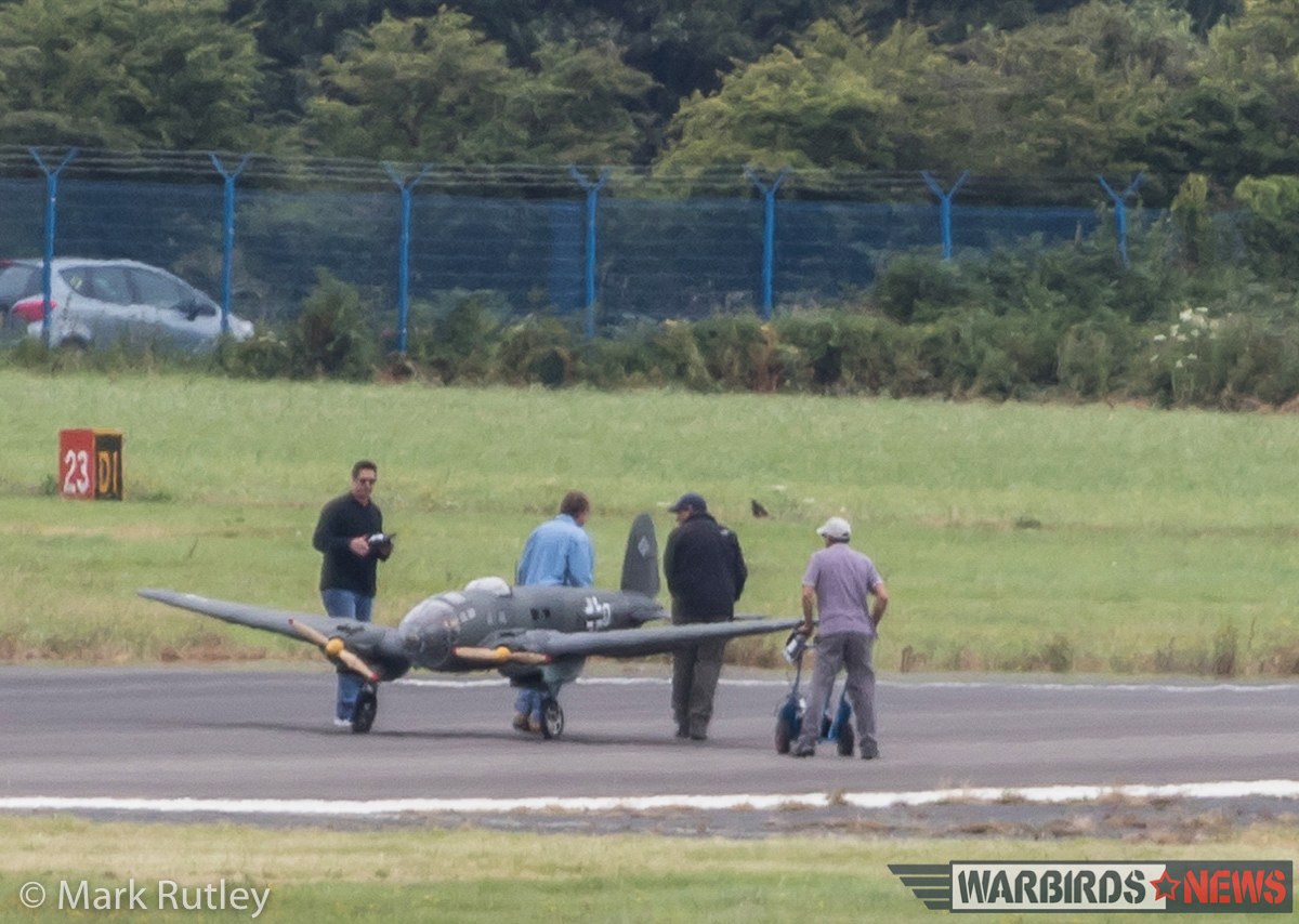 Dunkirk - Filming the Aerial Scenes for the Epic Movie 14 The film crew seen preparing one of the large-scale, remotely controlled He 111 bombers for flight. (photo by Mark Rutley)