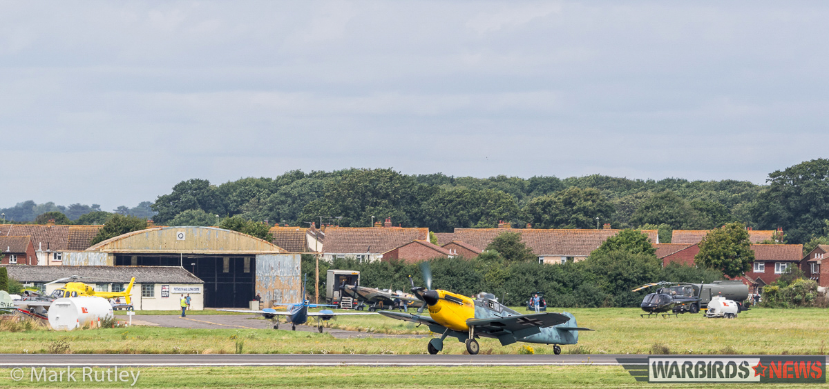 Dunkirk - Filming the Aerial Scenes for the Epic Movie 11 The Buchon, masquerading as its older sibling, the Me 109, taxiing for take off at Lee on Solent while a brace of Spitfires sit idly on the tarmac behind. (photo by Mark Rutley)