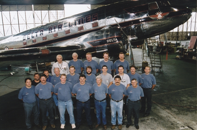 Delta Flight Museum Resumes DC-3 Tours 13 Members of Ship 41s restoration crew 1999. o