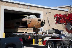 The Long and Winding Road of the City of Calgary's Mosquito Finally Leads to a Restoration 21 Mosquito CF-HMS emerges from her leaky city-owned warehouse. (Image Credit: Peter Cromer/Calgary Mosquito Society)