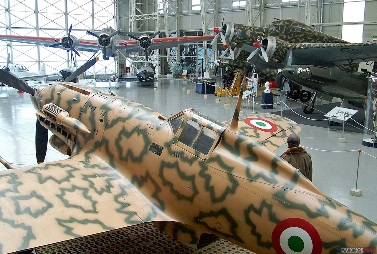 Italian Air Force Museum Unveils Reggiane Re. 2002 11 The Badoni Hall is the third of the Museum’s Halls and a classic example of a building in iron of the 1930’s. the Macchi MC.205 “Veltro” (MM 9546) in the foreground was built by Breda in 1942, modifying a MC.202 “X-series”; it displays the co-belligerent markings.