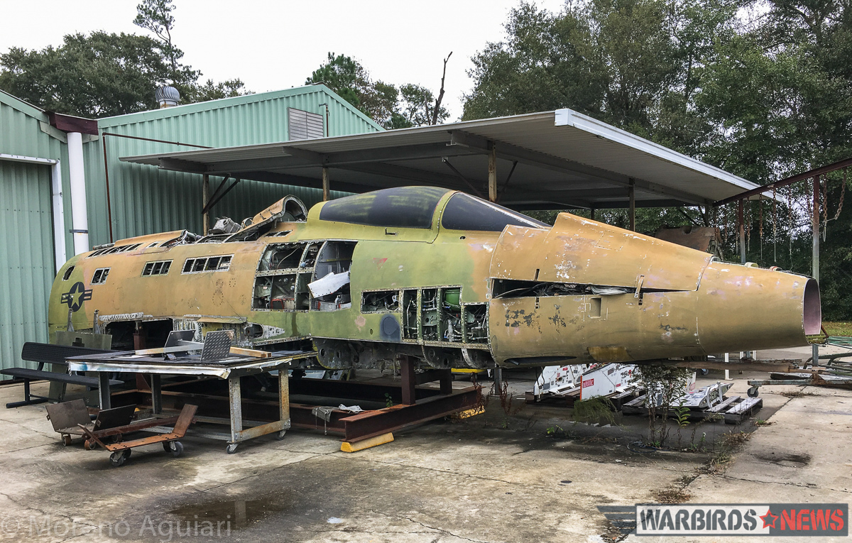 Combat Veteran F-100D Super Sabre Restoration 14 F-100D 56-2298, seen here in pieces outside the restoration shop at the Museum of Aviation, has provided many spare parts for the restoration of 56-2995, including a set of wings. (photo by Moreno Aguiari)