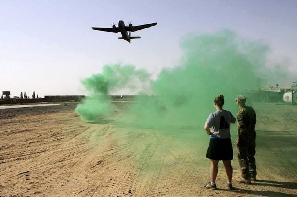 Endangered Species: The de Havilland Canada DHC-4 Caribou 15 N238PT performing a low level airdrop to troops in Afghanistan. Photo credit Sgt. Mark VanGerpen U.S. Army
