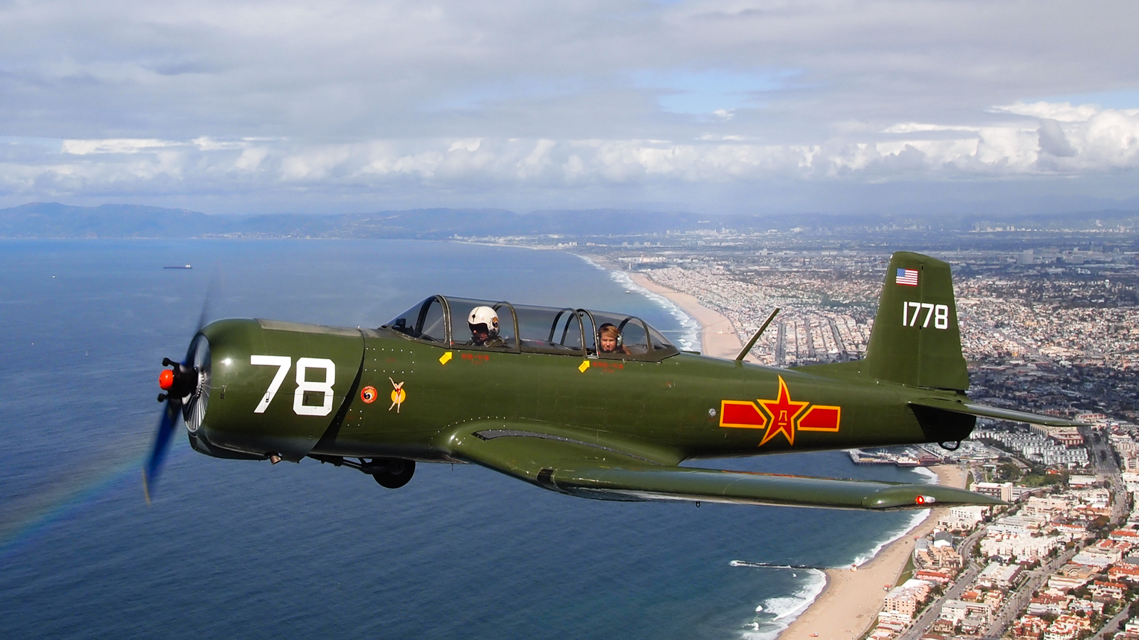 List of Affordable Warbirds 22 Nanchang CJ 6A Airplane over California Coastline N4183E 20110219