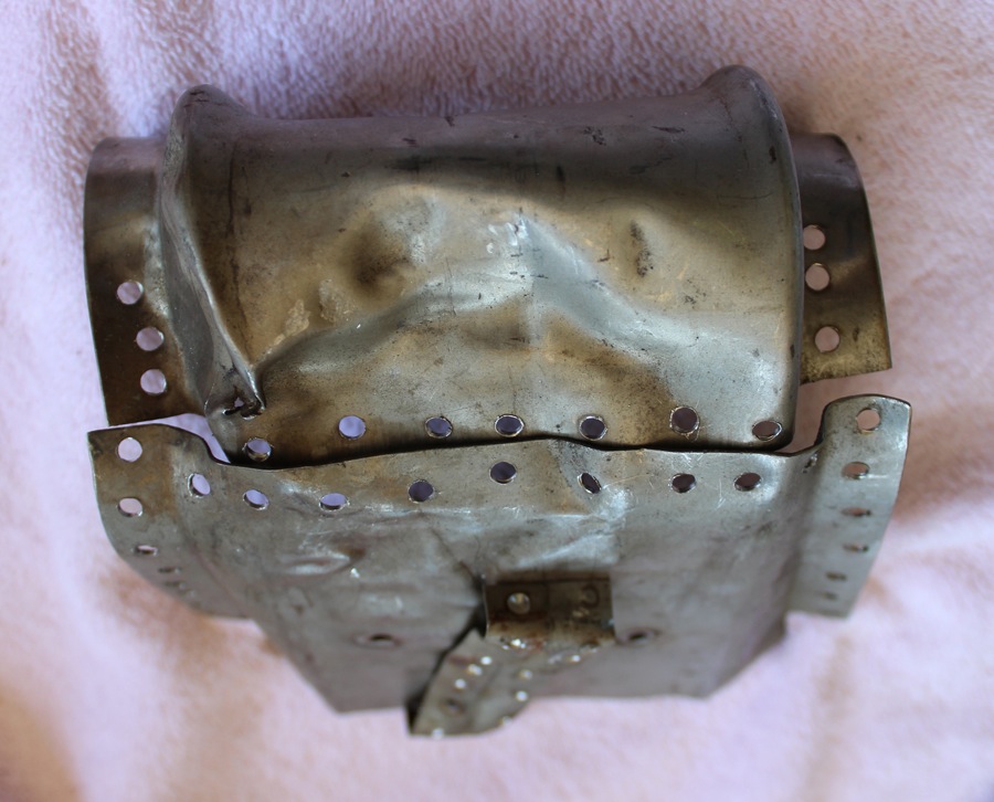 XP-82 Twin Mustang - May 2016 - Restoration Update 15 The original, heavily crumpled original ammo chute after drilling out the spot welds. (photo via Tom Reilly)
