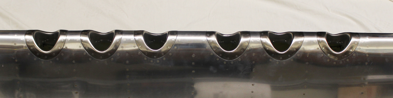 XP-82 Twin Mustang - April 2016 - Restoration Update 11 Original reworked stainless steel gun ports. (photo via Tom Reilly)