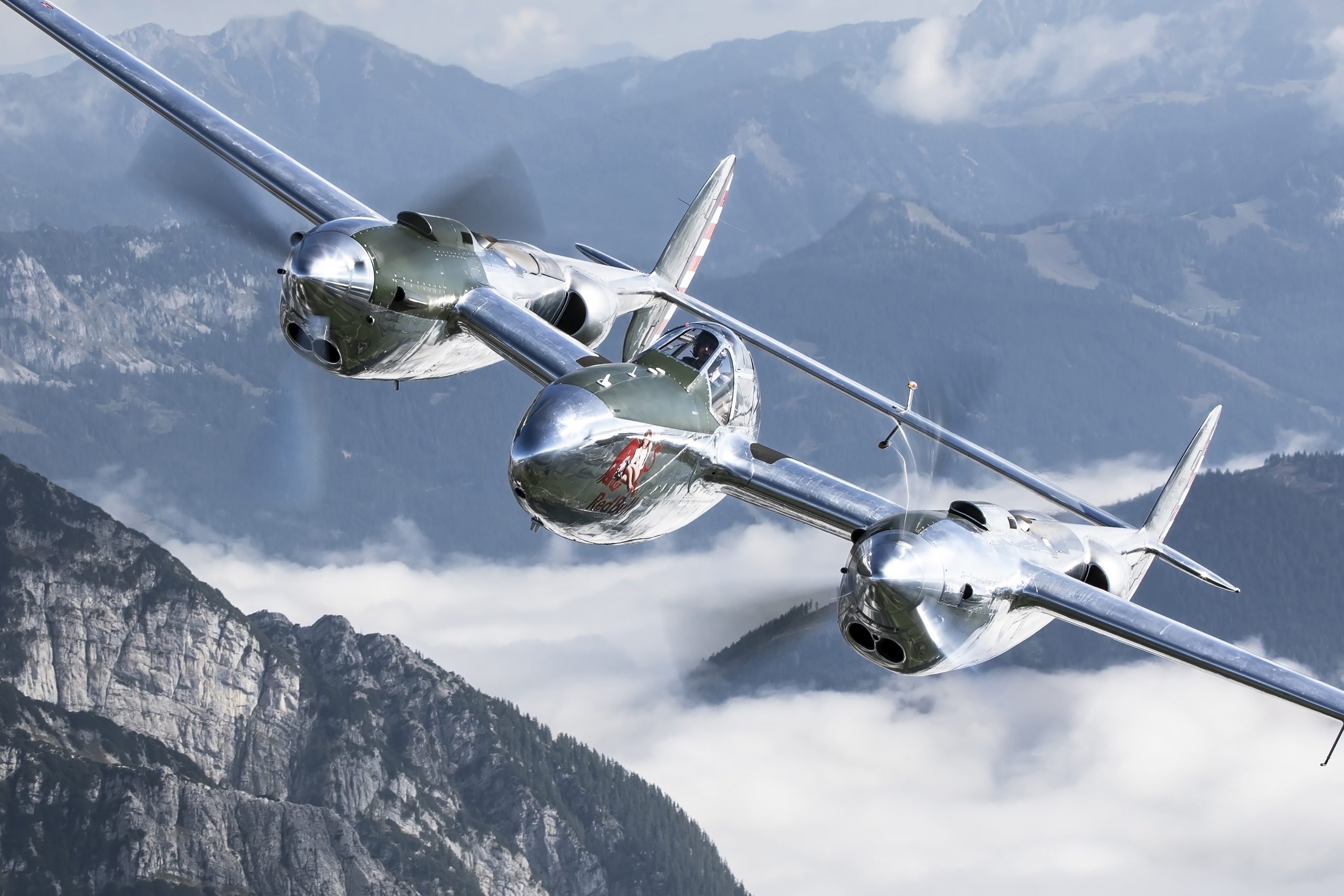 The Flying Bulls Bring P-38 Lightning and DC-6B at EAA AirVenture Oshkosh 2026 11 P 38 mountain flying on nose photo scaled