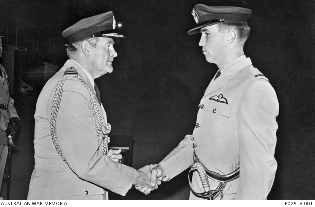 English Electric Canberra WD954 - Nose Section Restoration Update 12 Air Chief Marshal Sir Wallace Kyle GCB CBE DSO DFC ADC (RAF) (left) shakes hands with Flying Officer Michael Patrick John Herbert RAAF. (photo via Australian War Memorial)