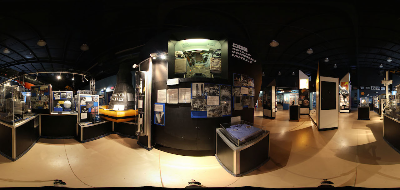 PIMA Air & Space Museum Ranked No. 2 Space Museum In The US 11 A mock-up of the Apollo 13 Command Module built for Walter Kronkite news coverage (in the greenish tinted window/box, center) and a black capsule used for rescue exercises grace other exhibits in the Space Gallery at the Pima Air & Space Museum (panoramic photo by John Saunders)