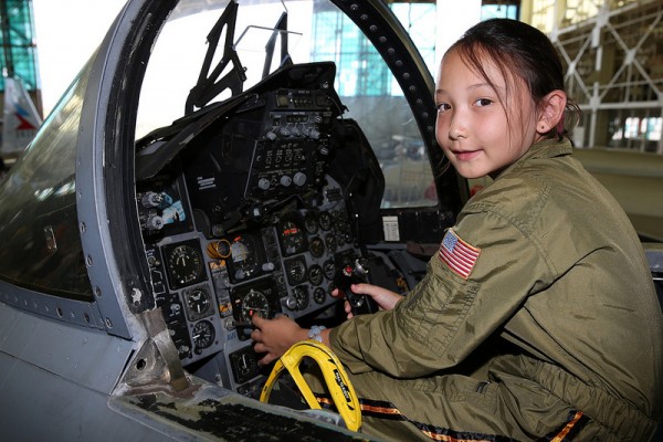 Upcoming Events At Pacific Aviation Museum Pearl Harbor 11 A your girl enjoying the excitement of "flying" a jet.(Image credit Pacific Aviation Museum)