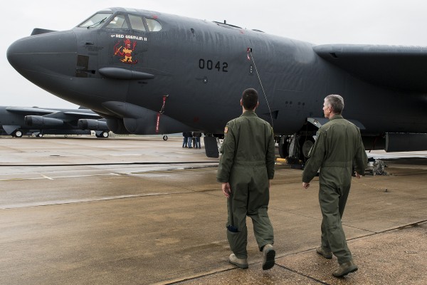 The Family Legacy Continues, Col.Paul Tibbets IV Qualifies on B-52 10 U.S. Air Force Col. Paul Tibbets IV (left) gets a closer look at the nose art on a 93rd Bomb Squadron B-52H Stratofortress, which resembles the nose art flown on the side of a B-17 bomber his grandfather piloted during World War II, at Barksdale Air Force Base, La., Nov 15, 2013. Brig. Gen. Paul Tibbets Jr., was best known for his atomic mission in the B-29 during World War II. (U.S. Air Force photo by Master Sgt. Greg Steele/Released)